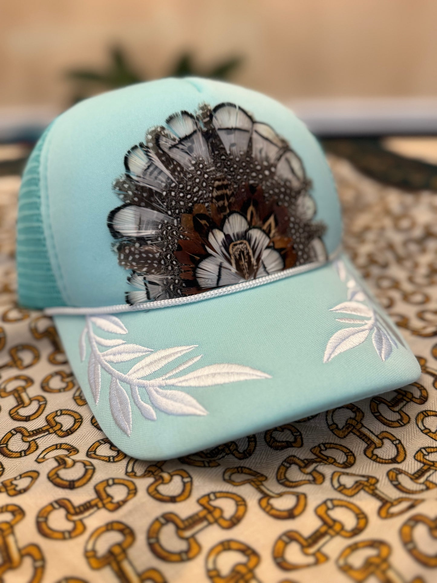 Rudy Laurel Feather Trucker